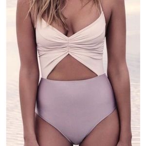 White and lavender cut out swimsuit