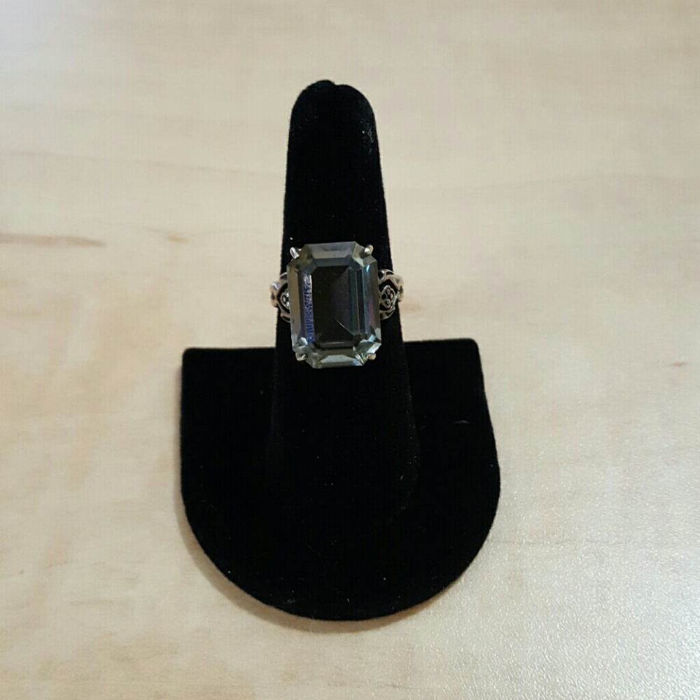 Large silver gemstone ring.