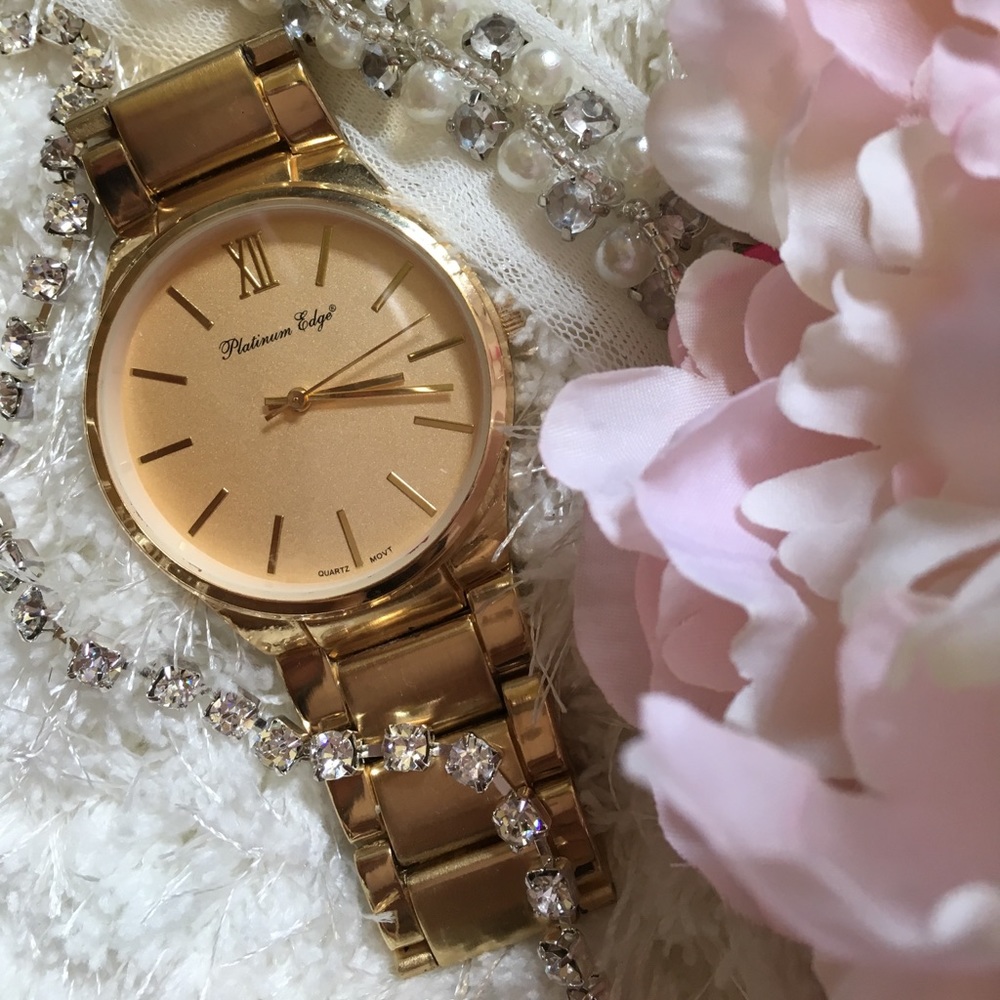 Golden colored Watch
