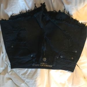 Black high waisted ripped shorts