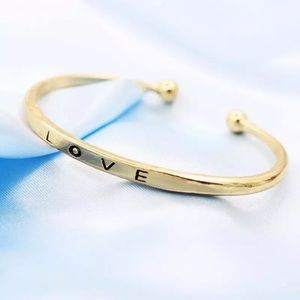 GOLD LOVE STAMPED BANGLE