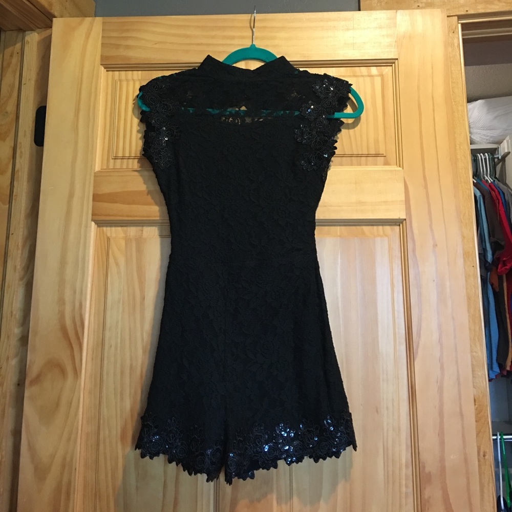 Brand new never worn black lace romper