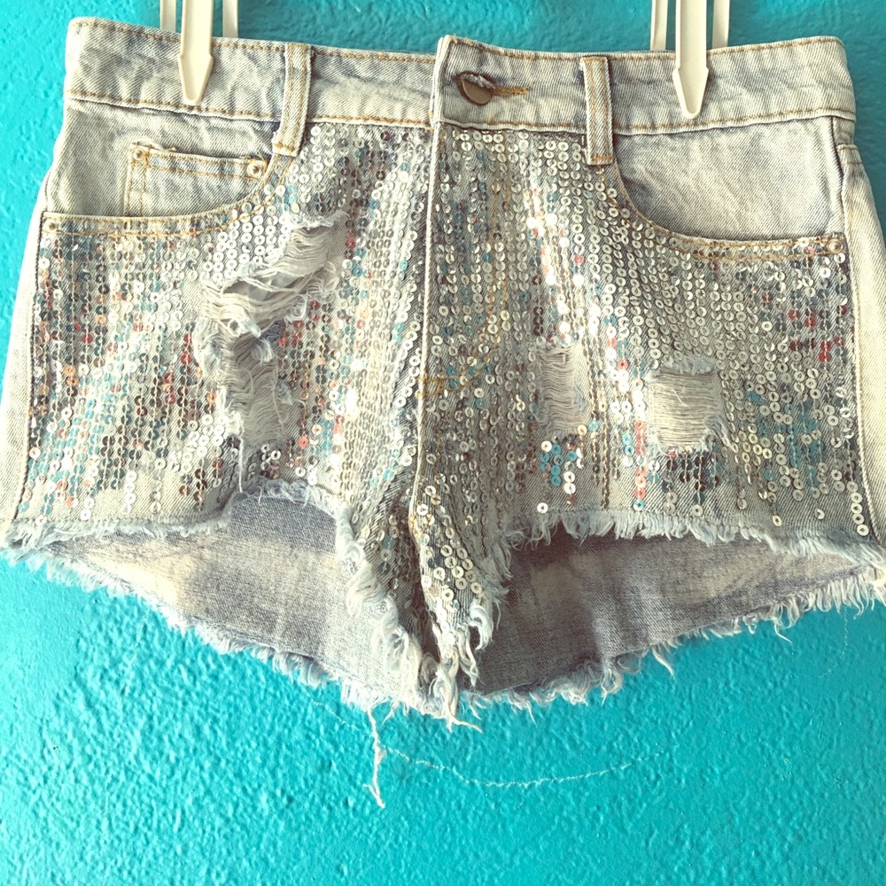 Distressed Denim sequin shorts. semi high waisted