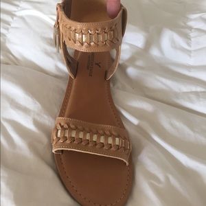 NWOT gladiator sandals with tassel and gold detail