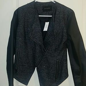 Black, gray, and white angled zip jacket