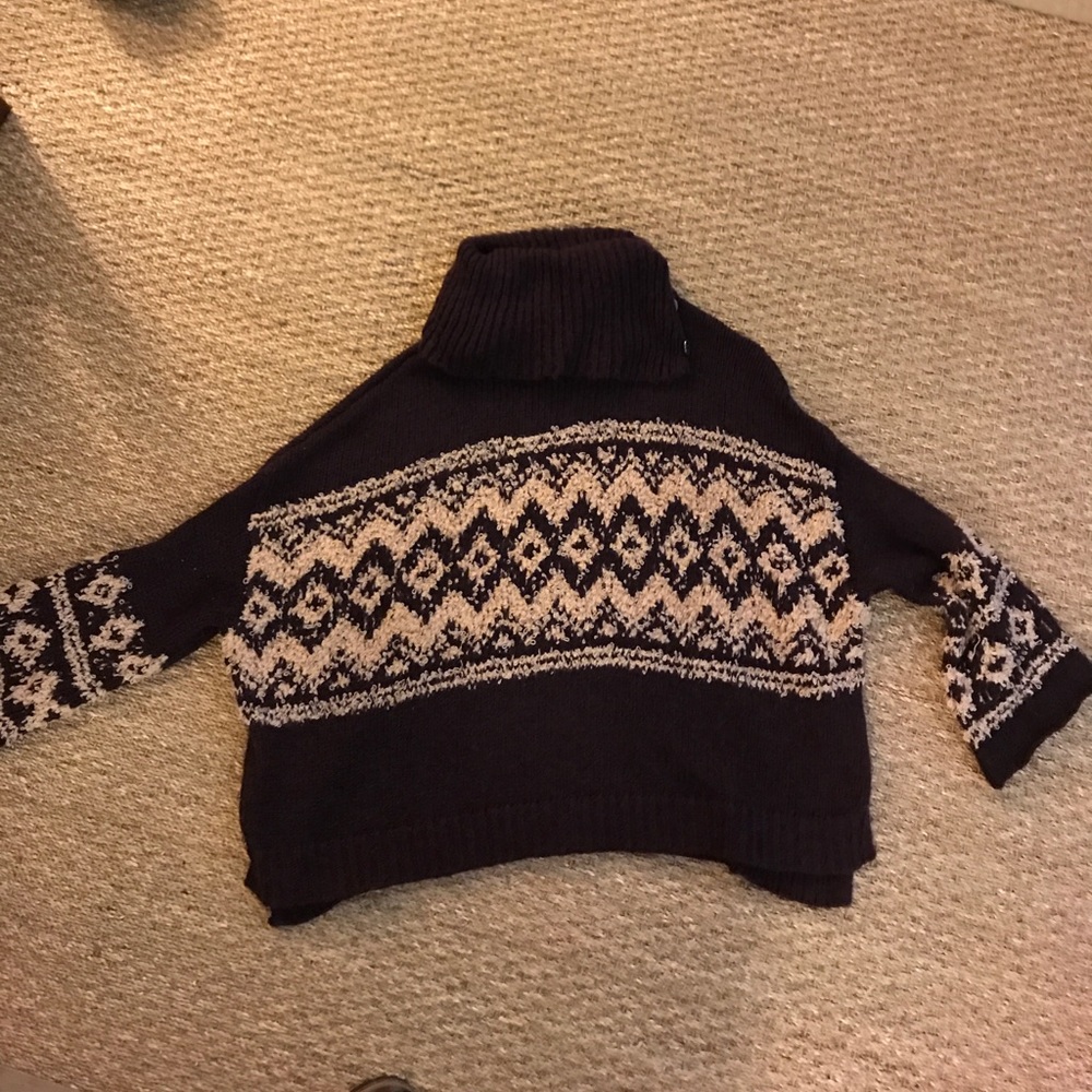 purple and cream sweater