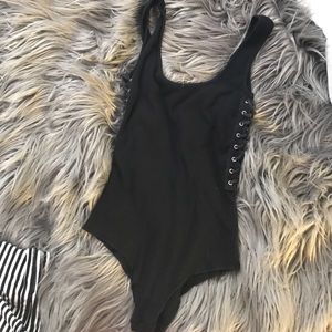 Extra small body suit w ties on the side