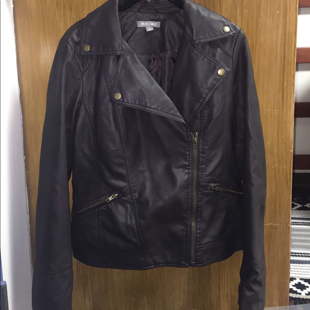 Brown leather jacket with gold accent buttons
