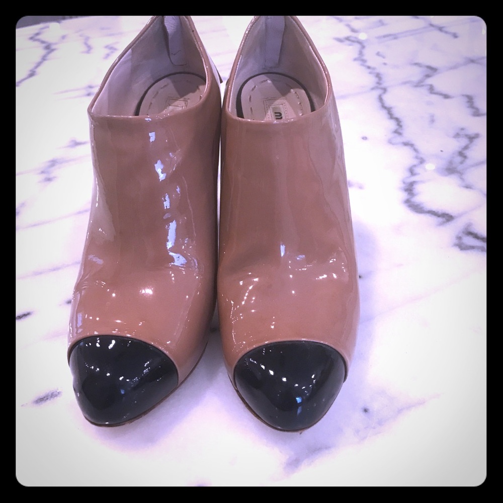 Miu Miu Pantent leather booties