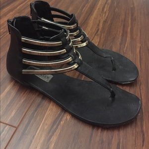 Steve Madden black and gold sandals