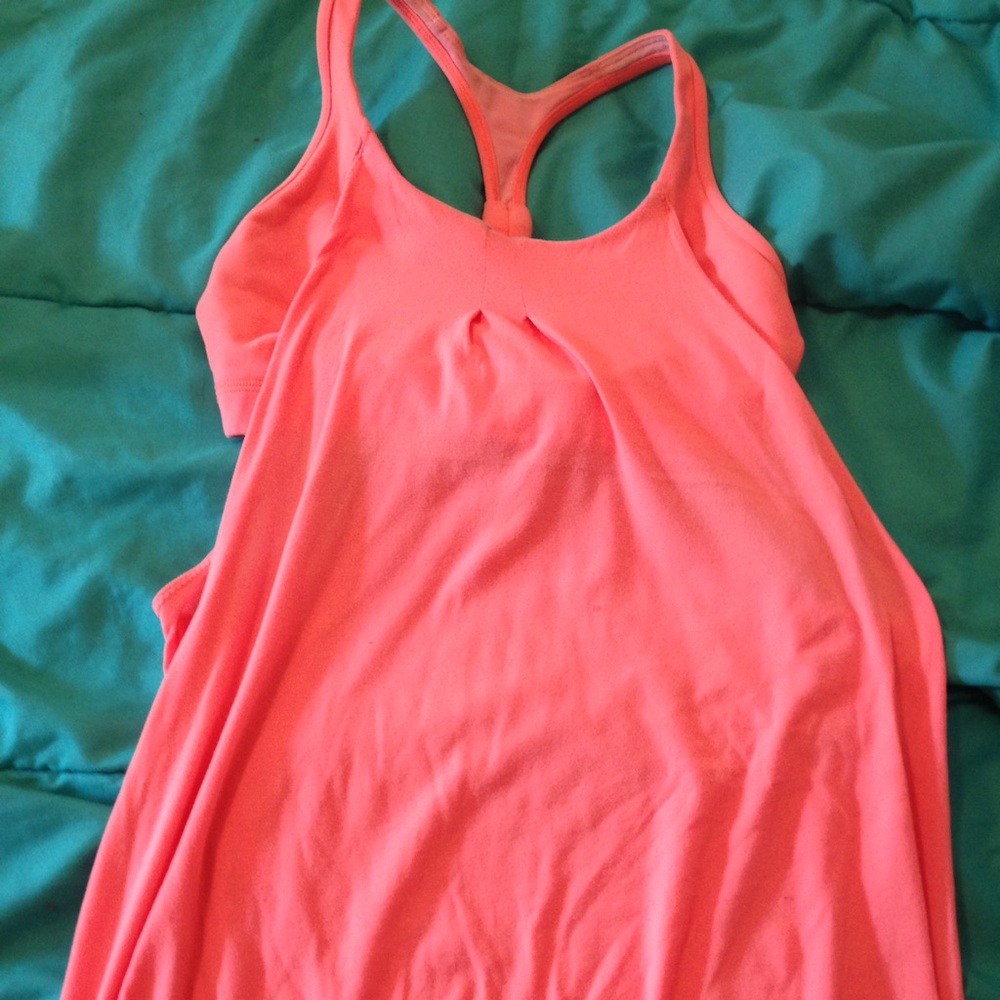 Two LuLu Lemon workout tops w/built in sports bra