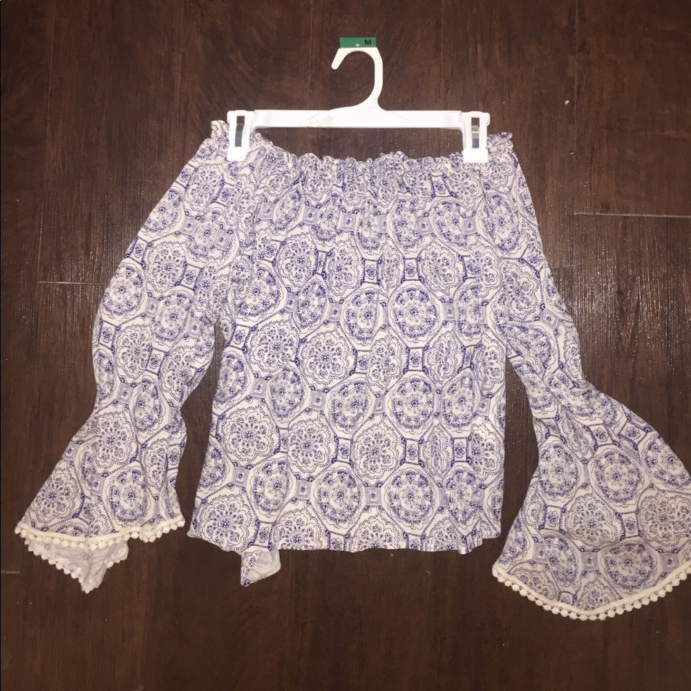 Solemio navy and blue off the shoulder shirt