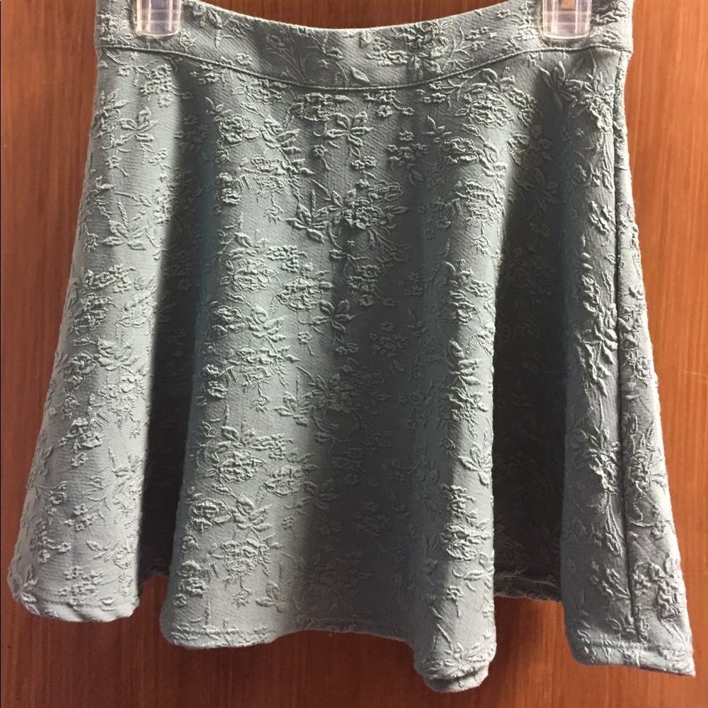 Flowered patterned teal skirt