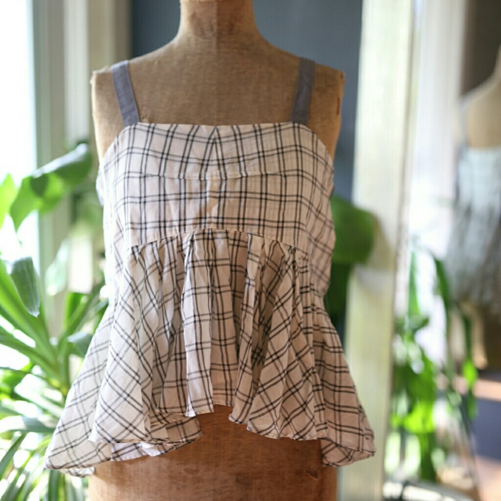 SOLD.  NWT FREE PEOPLE Window Pane Peplum Tank