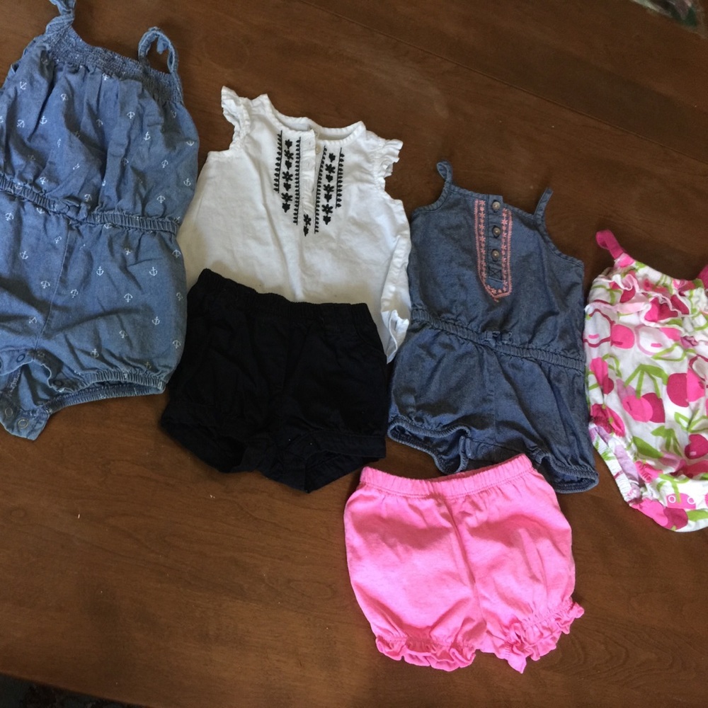 4 girl outfits and a pair of shorts.