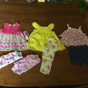 Three cute outfits and two onesies.