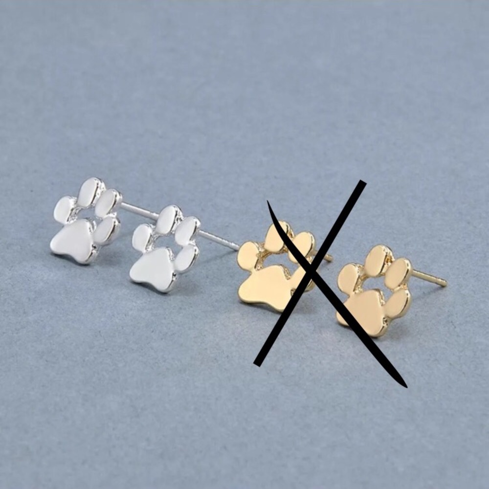 Silver dog paw stud earrings