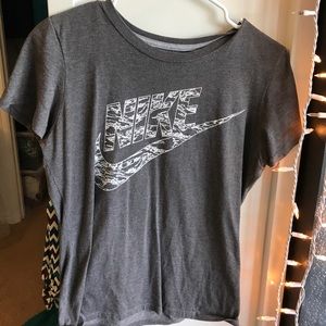 Gray and white nike tee
