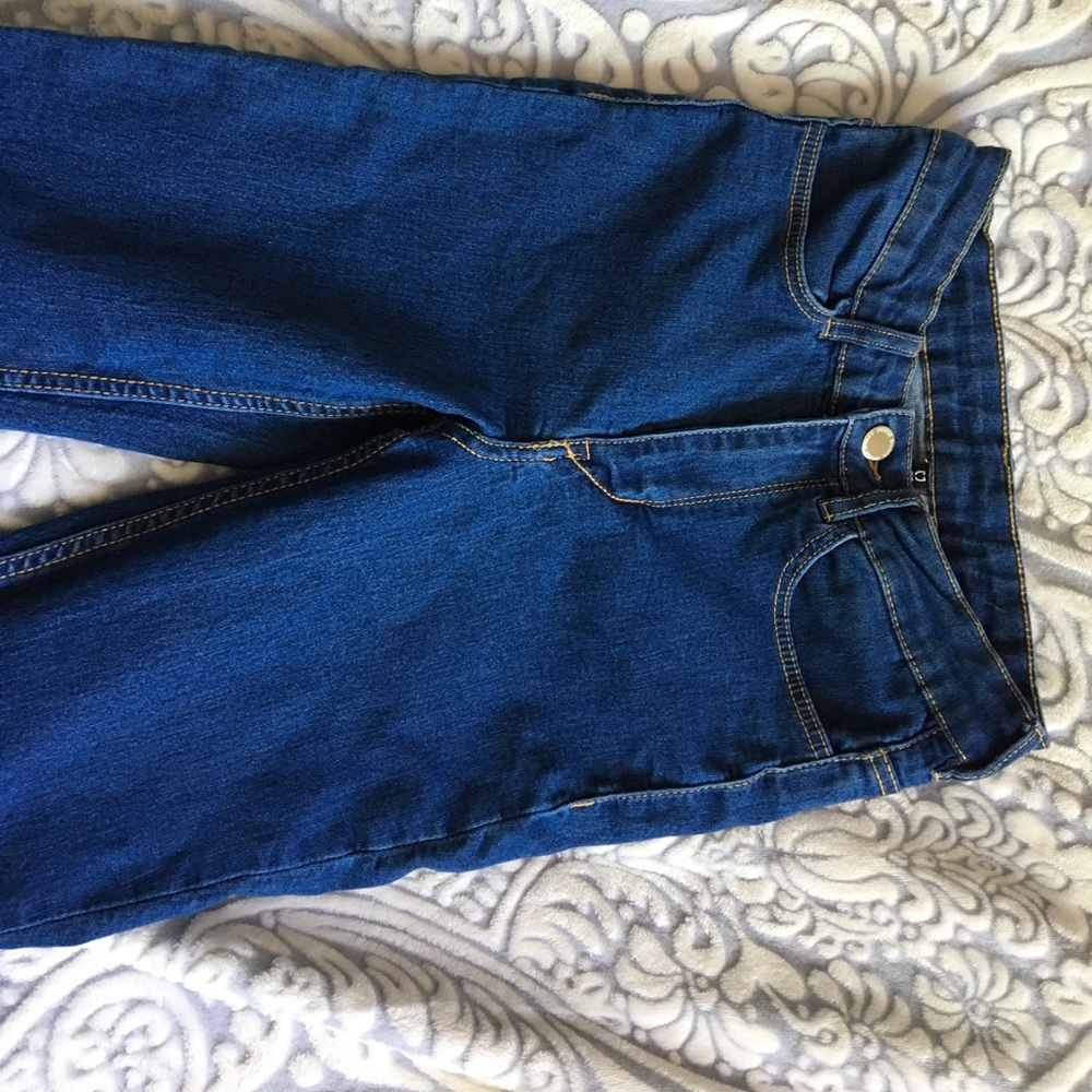 High waisted blue jeans