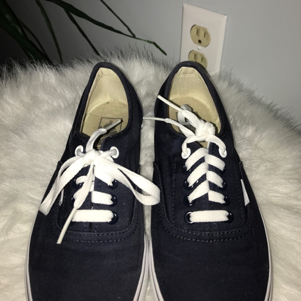 Navy low top vans