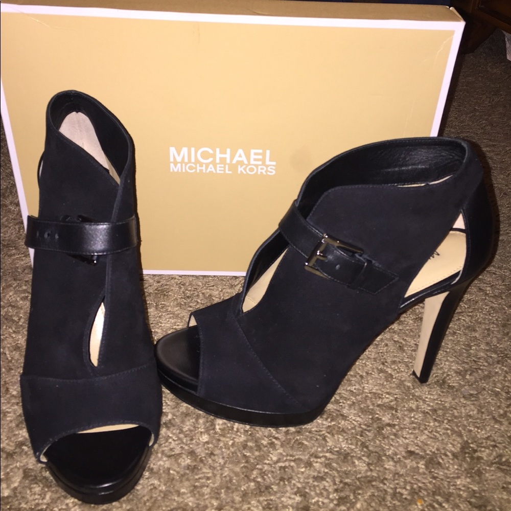 Brand new Mk heels never worn