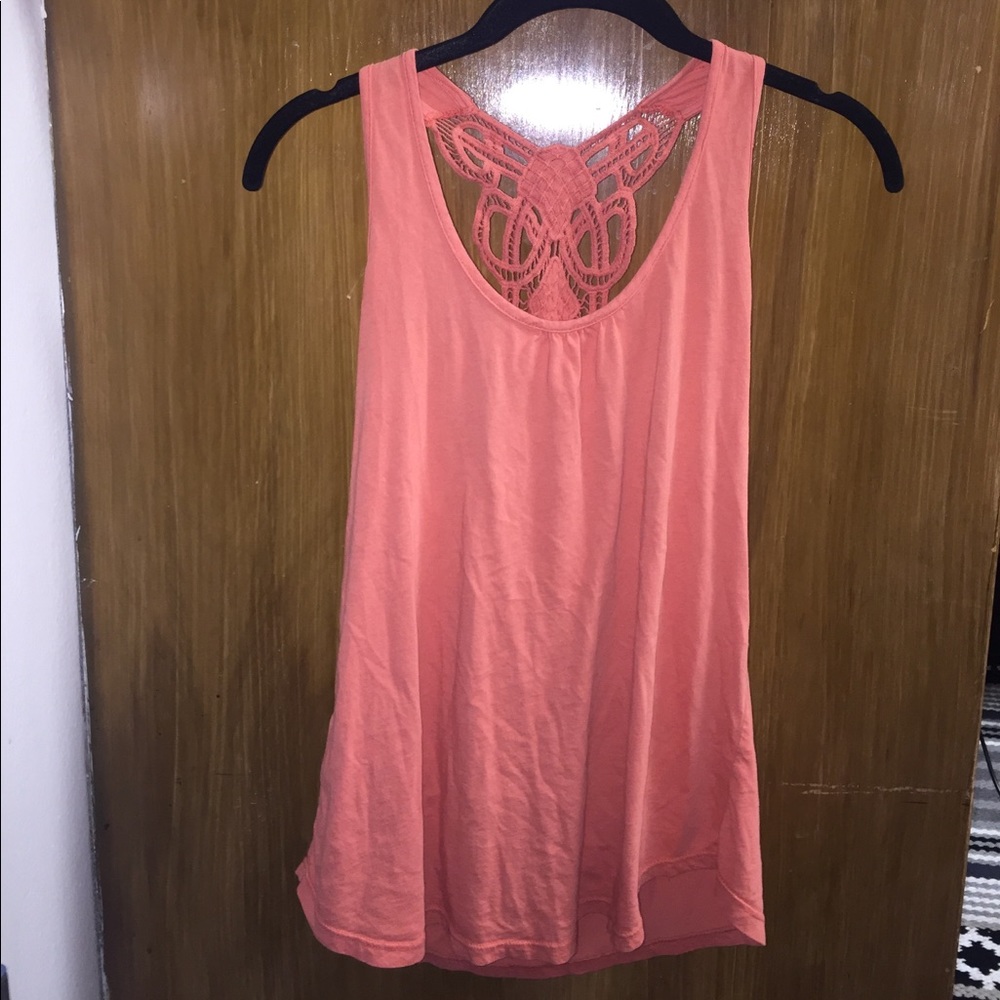 Orange tank top with lace design on back