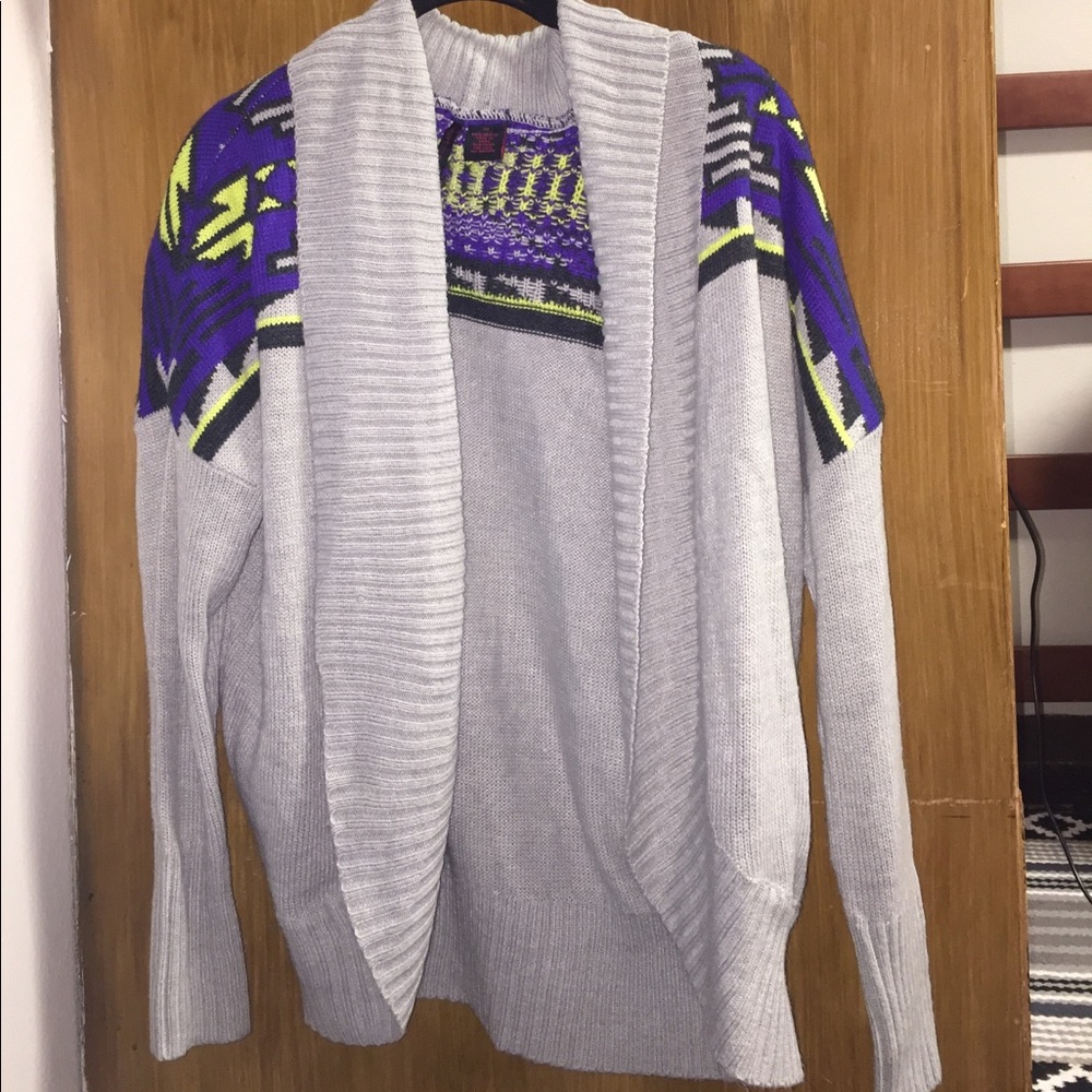 Gray cardigan with black, blue, and yellow design