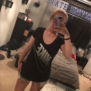 Black Nike shirt with gray swoosh