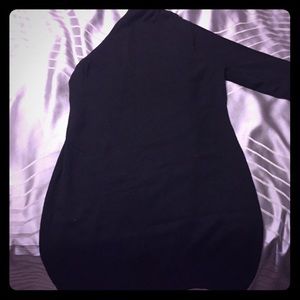 Black sweater one sleeve dress .
