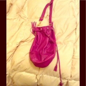Fuschia lambskin cross body bag
