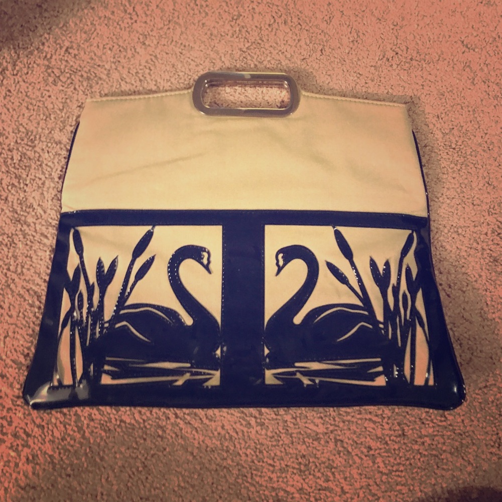 Like new, barely used unique, vegan clutch purse.