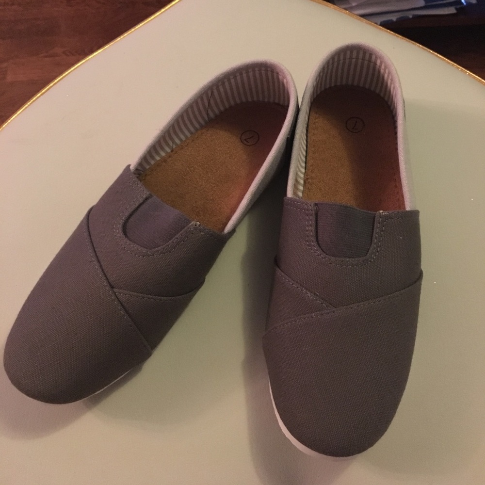 Grey slip on shoes