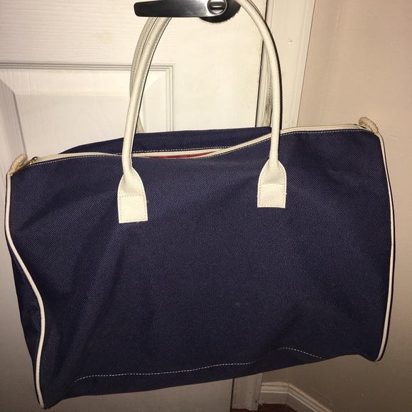 Estee Lauder Handbags - Estée Lauder Blue Canvas Overnight Travel Bag