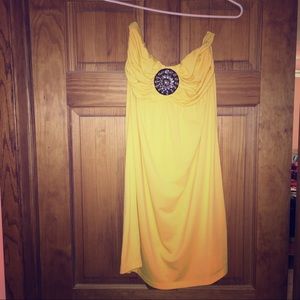 Bright yellow strapless dress