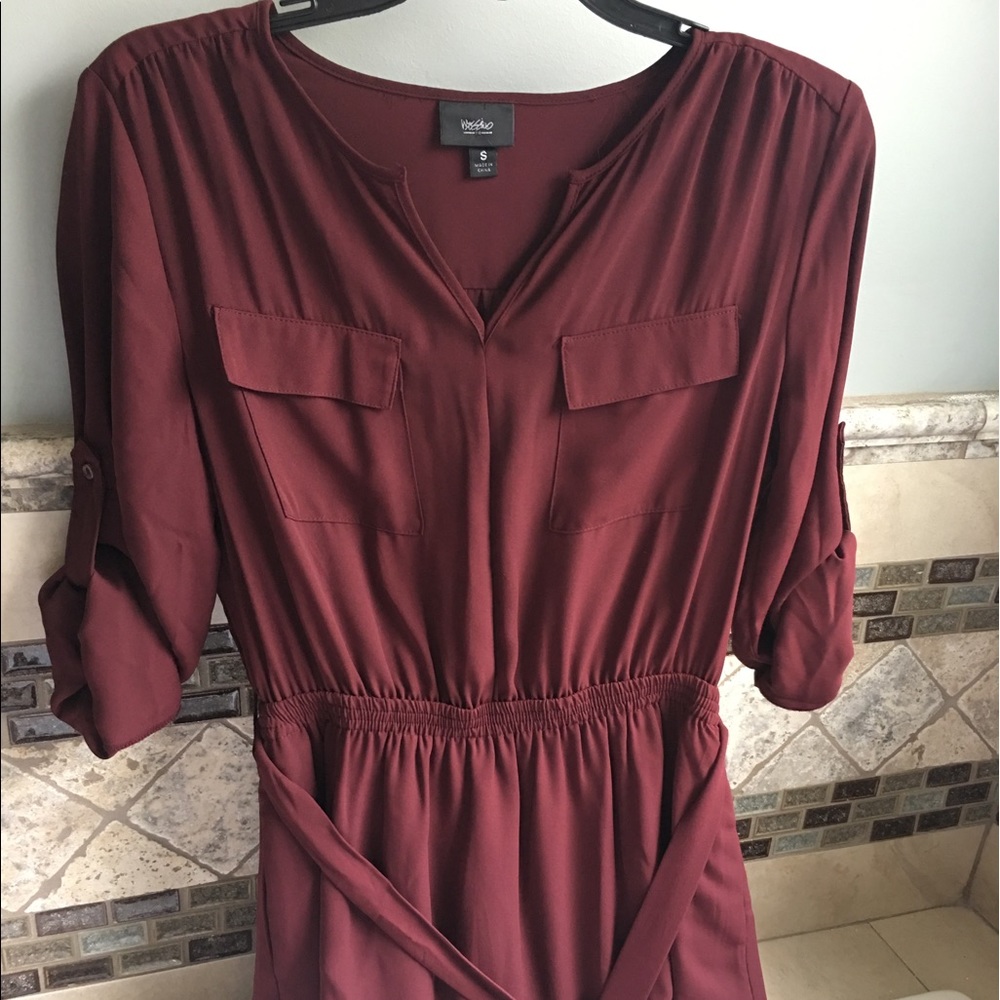 Burgundy dress with belt.