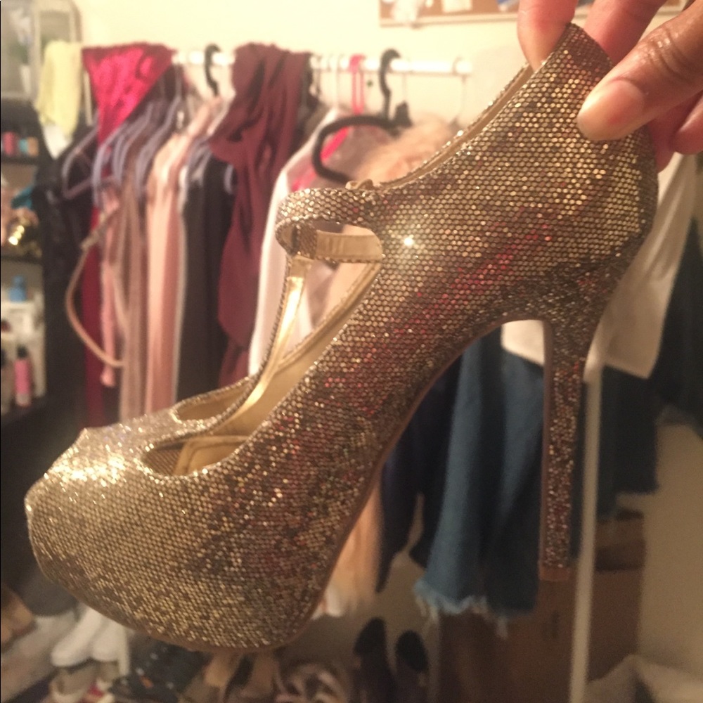 Gold platform heel.