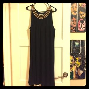 Long black dress with sequin neck like