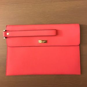 Hot pink Kate Spade clutch