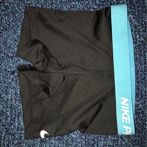 Black and blue Nike Pro spandex.