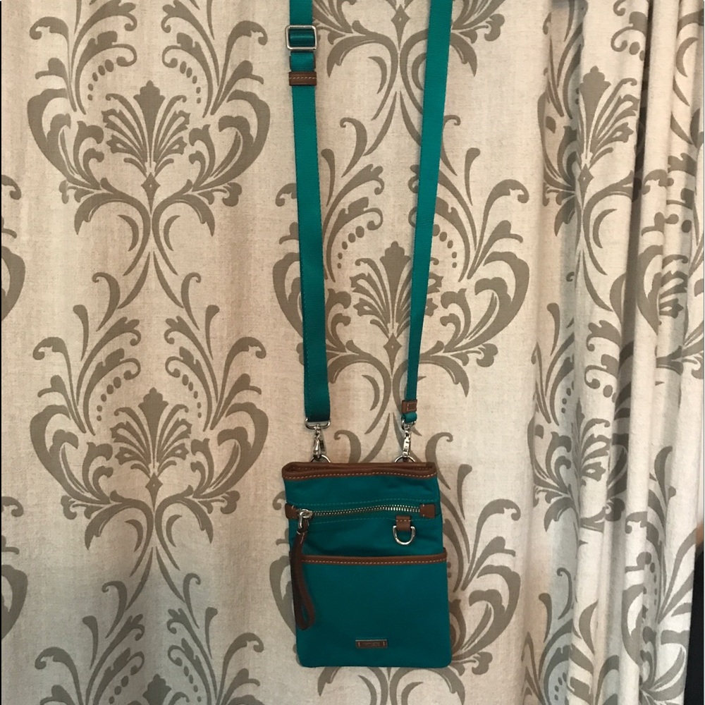 💰SOLD💰Authentic teal tumi travel crossbody
