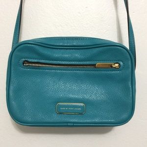 A small Marc by Marc Jacobs turquoise bag