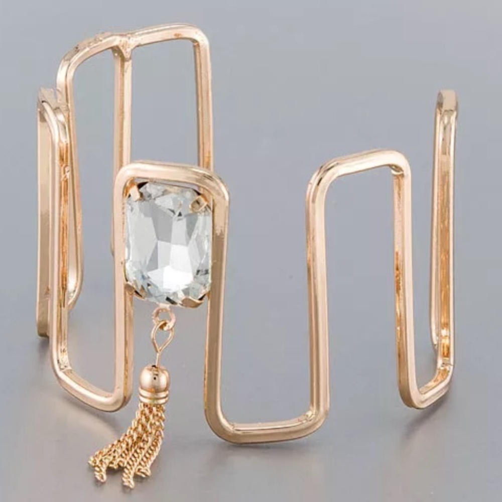 Rose Gold finish with clear stone and tassel cuff
