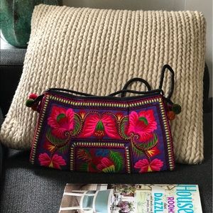 Floral Embroidered cross body bag.