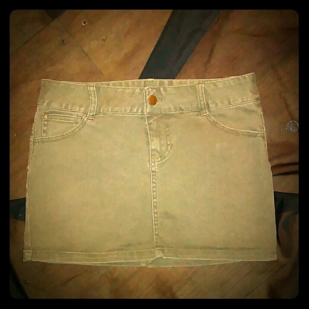 Green denim mini skirt