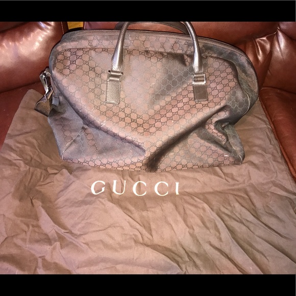 Gucci Handbags - Authentic Gucci travel/duffle bag brown