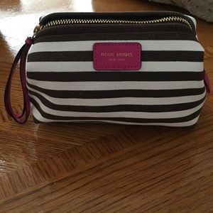 This is a Henri Bendel cosmetic case new