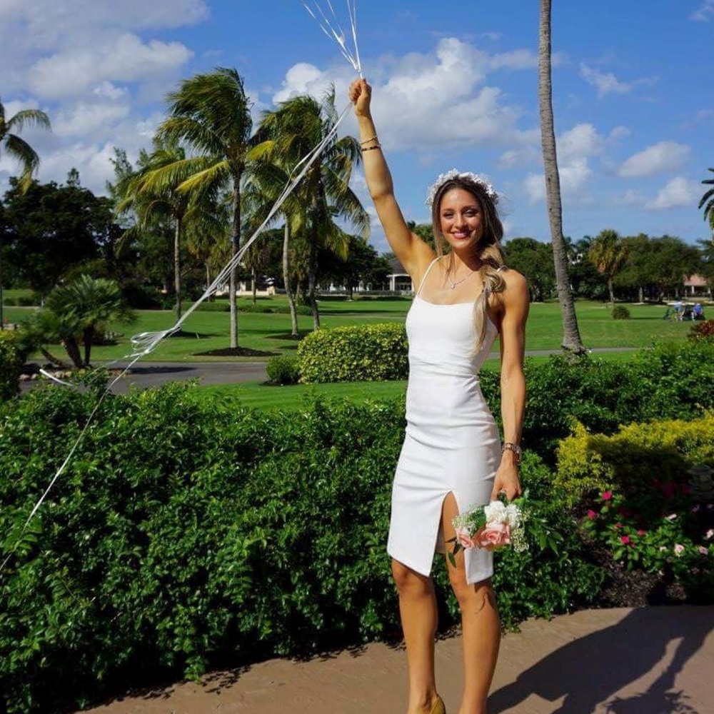 Lulus white bodycon dress with slit!