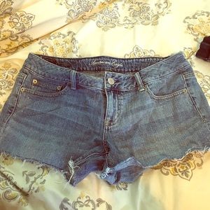 American eagle medium wash shorts with sparkles