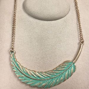 NWOT Feather necklace with green patina
