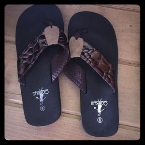 Brown flip flops